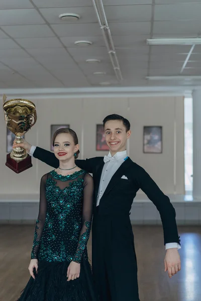 Professional dancers dancing in ballroom