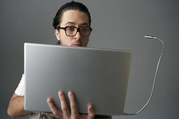 young man with laptop