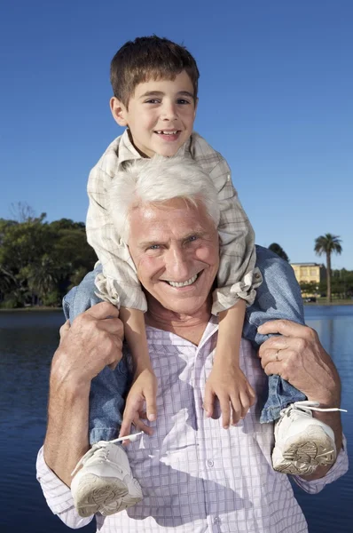 Grand father with his grandson in the park