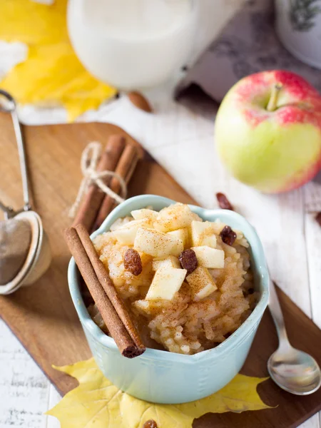 Rice porridge with apple and maple syrup