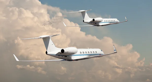 Two private jets flying side by side