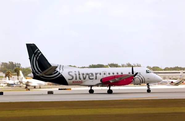 FORT LAUDERDALE, USA - JUNE 2, 2015: A Silver Airways Saab 340B aircraft at the Fort Lauderdale/Hollywood International Airport. Silver Airways is a U.S. Airline operating around 150 daily flights.
