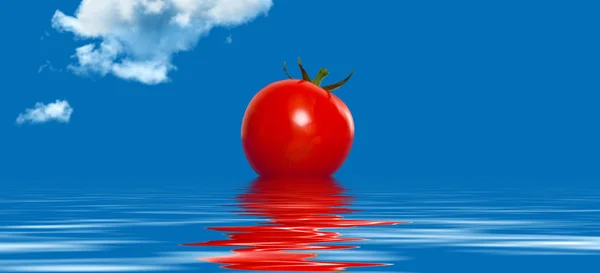Tomato floating on water