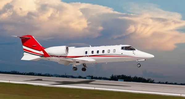 Fort Lauderdale, USA - 2015: A private jet landing at the Fort Lauderdale/Hollywood International Airport.