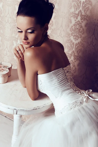 Beautiful tender bride in elegant wedding dress