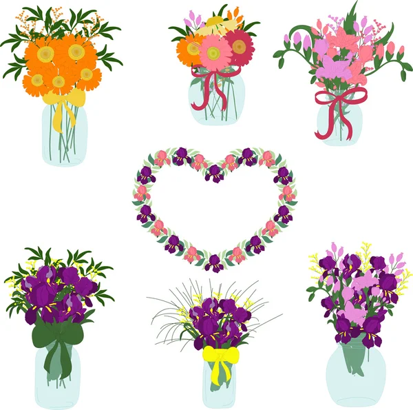 Bouquets of iris, freesia, dahlias, tulips, herbera in jars
