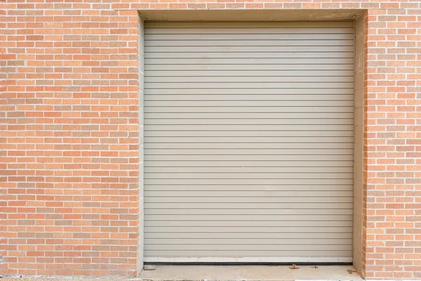 Automatic roll up warehouse door