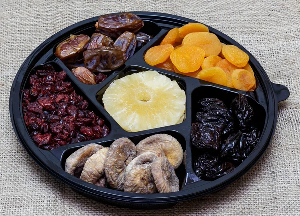 Group of dried fruit for Tu Bishvat holiday . Apricot, fig, palm, and plum, blueberry and pineapple
