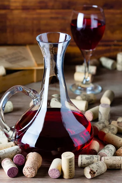 Glass of wine, decanter and wine corcs. Wine concept