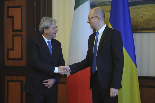 Prime Minister of Ukraine Arsenii Yatseniuk meets with Italy's Foreign Minister Paolo Gentiloni in Kyiv on October 27, 2015.