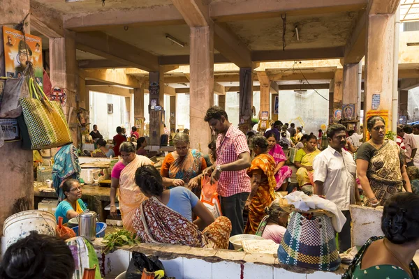 People selling fish at a street market, main daily market.