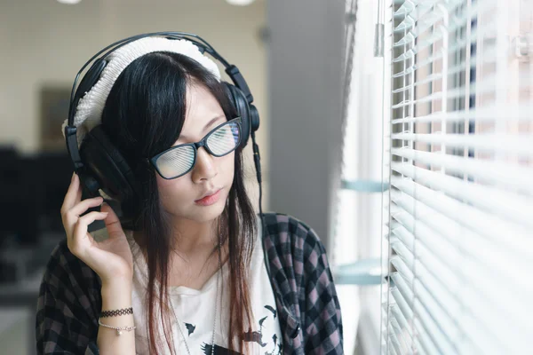 Asian girl with earphones