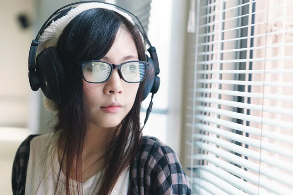 Asian girl with earphones