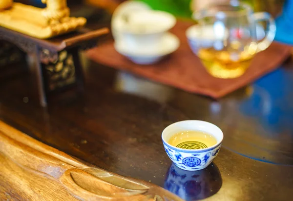 A cup of whole leaf lapsang souchong tea, a rich smoky flavored tea