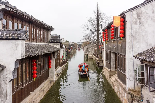 XITANG, CHINA - SEP 16: people walking at Xitang ancient town on Sep 16, 2013 , Xitang is first batch of Chinese historical and cultural town, located in Zhejiang Province, China.