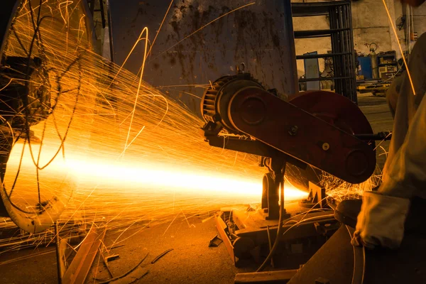 Sparks while grinding iron