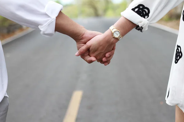 Hold hands and walk together