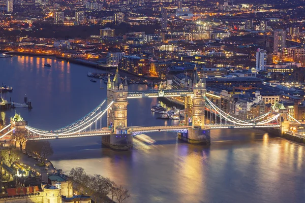 London, England - Tower Bridge and River Thames aerial view at magic hour