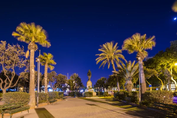 Malta, Valletta - small square at night with palm trees