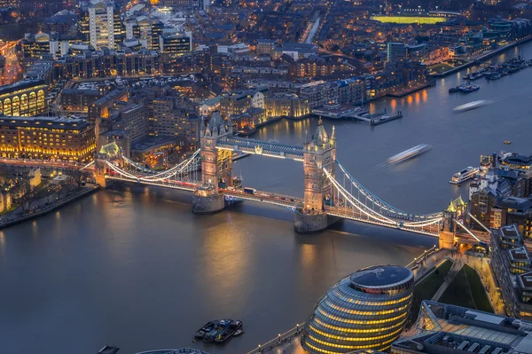 London, England - Aerial view of the world famous Tower Bridge, City Hall and the Tower of London by night