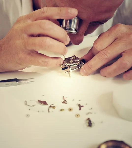 Watchmaker making luxury handmade watch