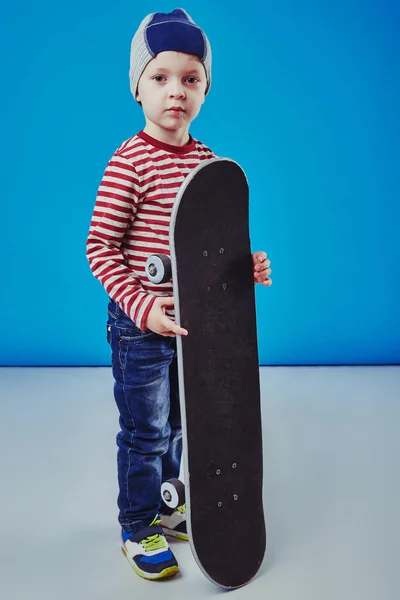 Happy boy riding skateboard
