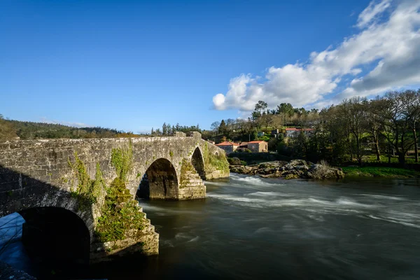 Ancient bridge on River Tambre, Spain