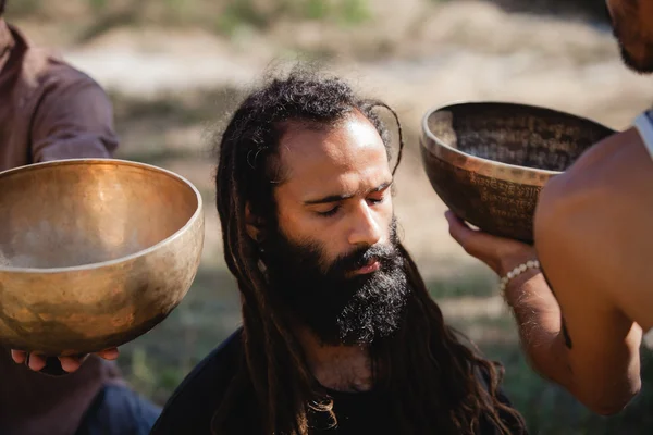 Sound meditation with Tibetan singing bowls at Avatar Yoga Festival