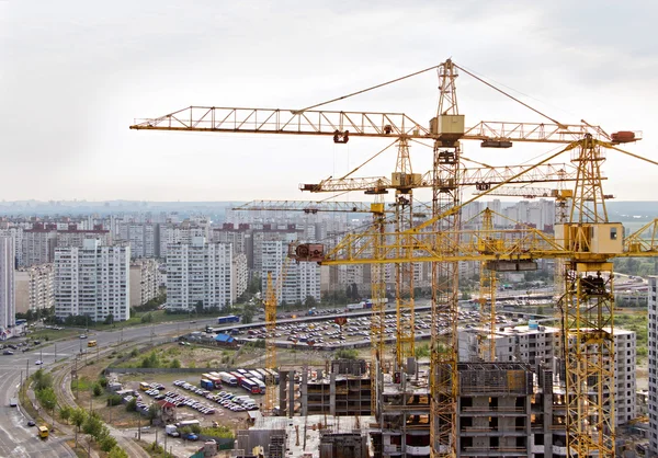 Cranes and housing estate