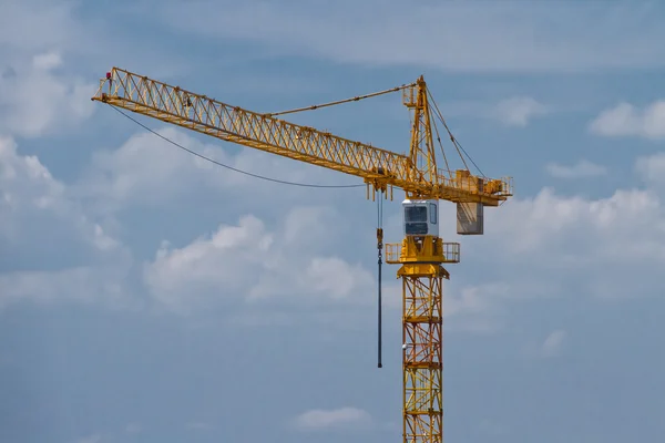 Yellow construction tower crane