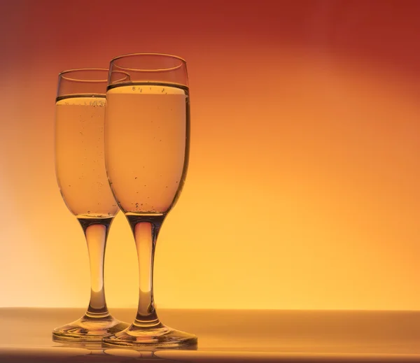 Two champagne glass with bubbles