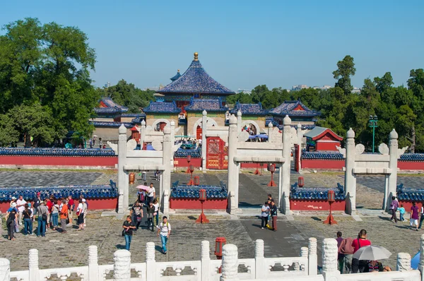 BEIJING, CHINA - SEPTEMBER 26, 2012: Tourists visit a Lingxing Gate of the Circular Mound Altar in the complex the Temple of Heaven in Beijing, China