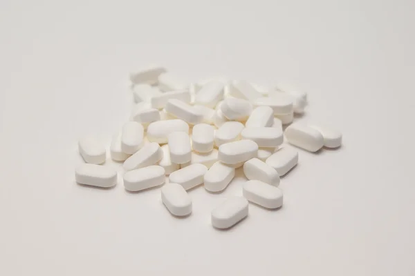 Handful of white pills