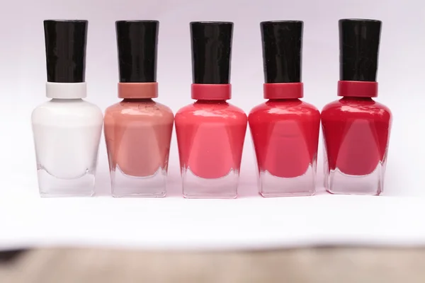 Bright red, pink and white nail polish colors