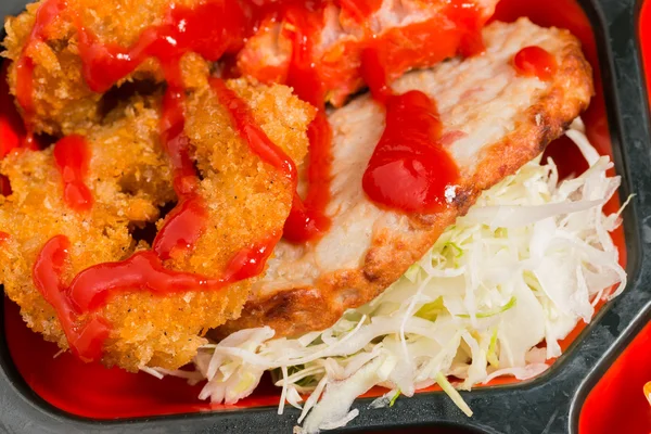Japan Food of chicken fritter with Tomato Sauce.
