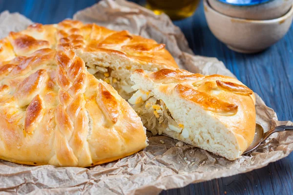 Yeast cake with filling - stewed cabbage with egg.