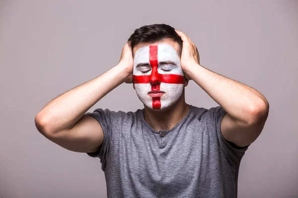Unhappy and Failure of goal or lose game emotions of  Englishman football fan in game supporting of England national team