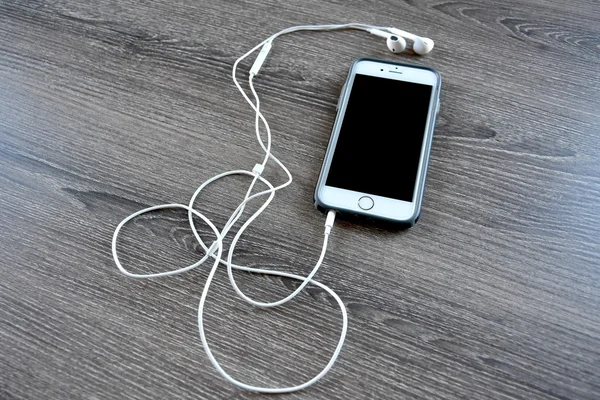 Apple iPhone with headphones