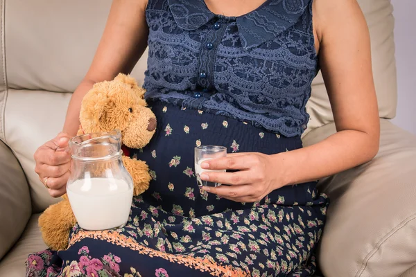 Pregnant Women drinking milk