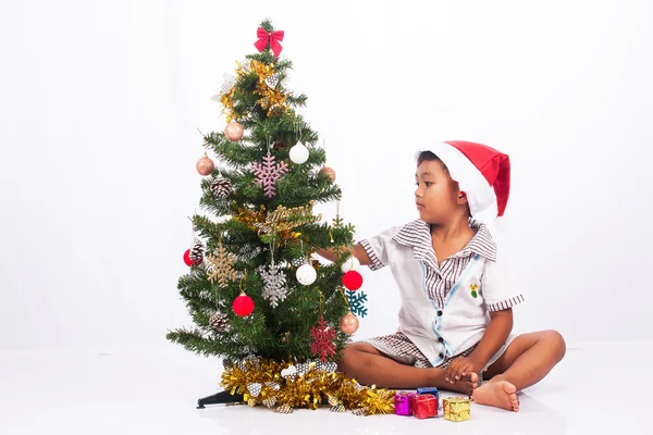 Cute boy play christmas tree collection