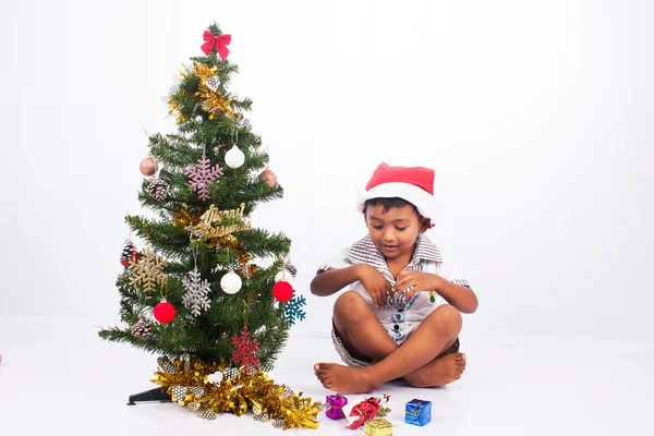 Cute boy play christmas tree collection