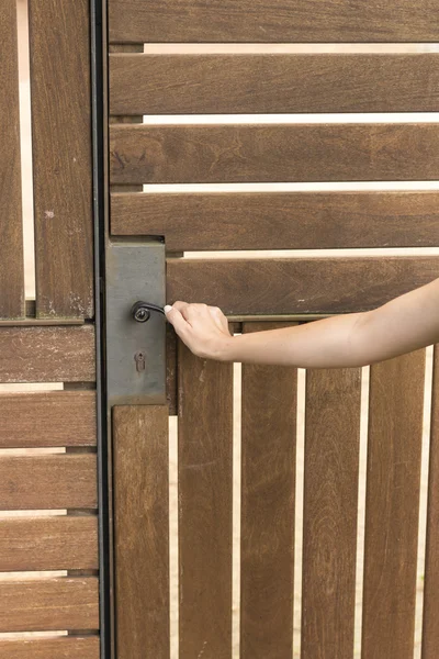 Woman hand open door