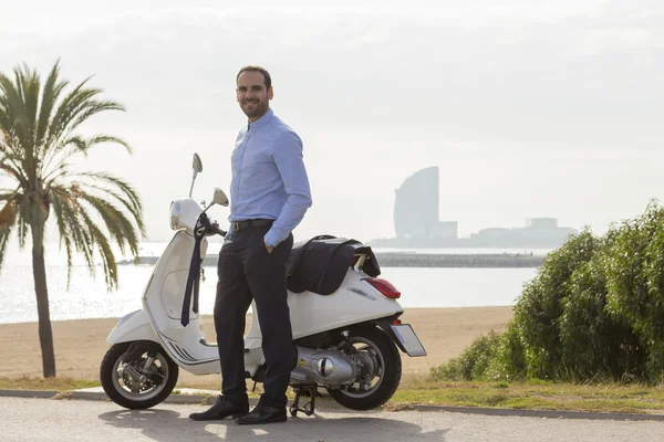 Business man with his scooter