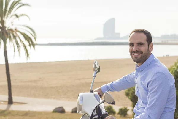 Business man with his scooter