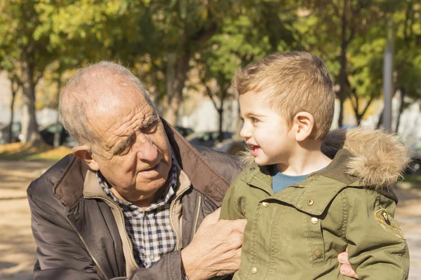 Portrait of a grandfather and son