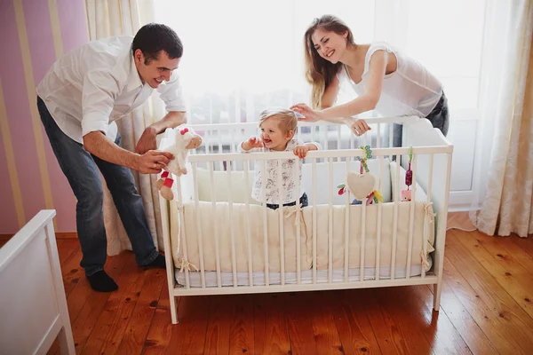 Beautiful family of three people, mom dad and daughter