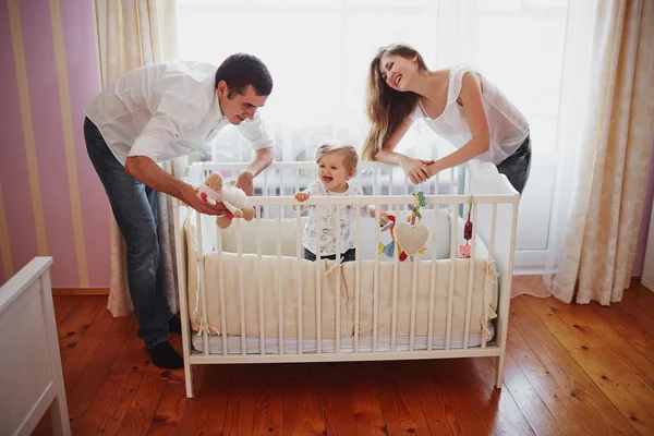 Beautiful family of three people, mom dad and daughter