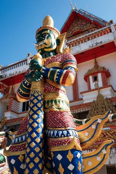Green giant statue guarding Thai temple (the creation and maintenance was funded by the donation of Thai people, and considered as public property)