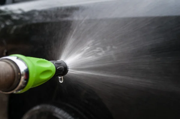 Green Spray Water Nozzle Washing Car