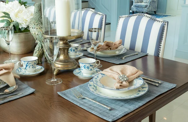 Luxury table set in classic style dining room interior
